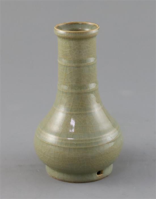 A Chinese celadon bottle vase, H. 15.4cm